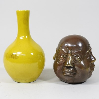 Lot 396 - A Buddha and a vase