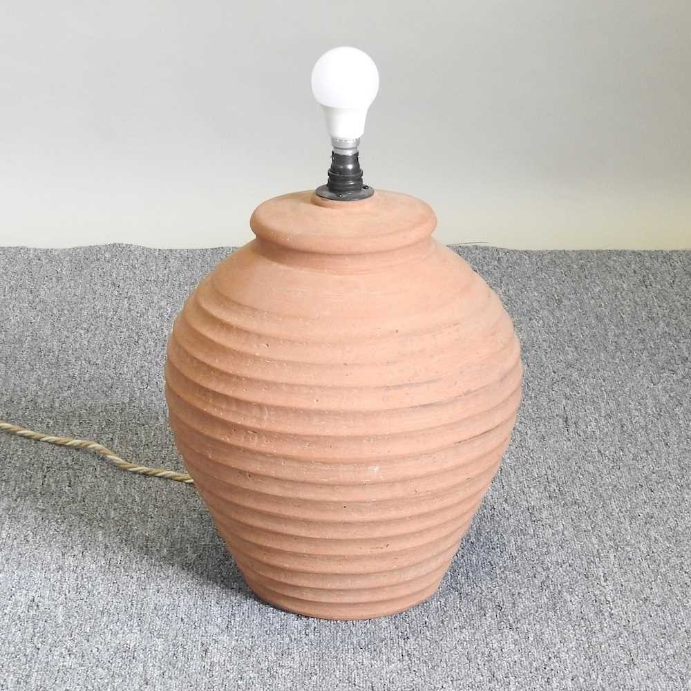 Lot 461 - A terracotta table lamp