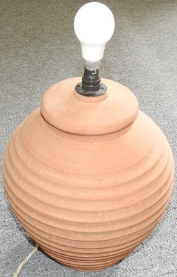 Lot 461 - A terracotta table lamp