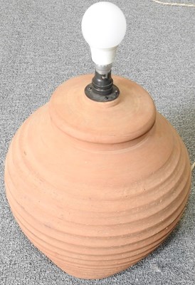 Lot 461 - A terracotta table lamp