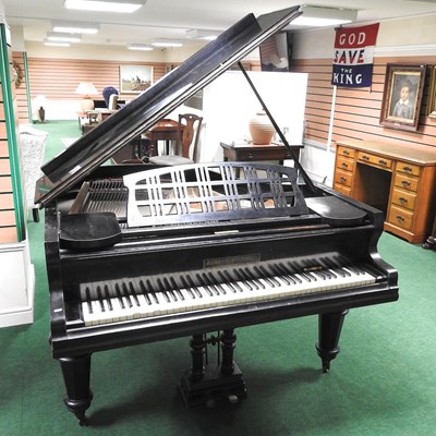 Lot 505 - A baby grand piano