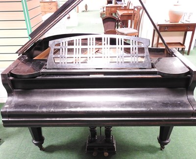 Lot 505 - A baby grand piano