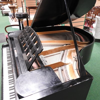 Lot 505 - A baby grand piano