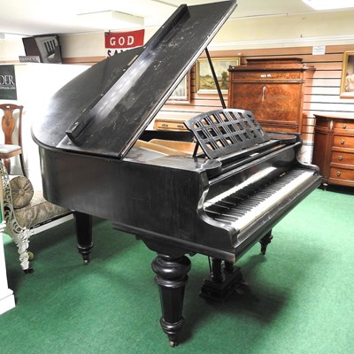 Lot 505 - A baby grand piano