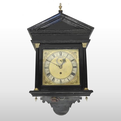 Lot 99 - A George III style ebonised hood clock