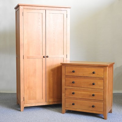 Lot 122 - An oak wardrobe and chest