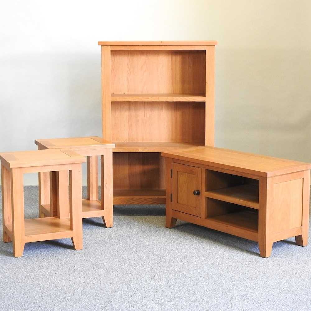 Lot 23 - A collection of light oak furniture