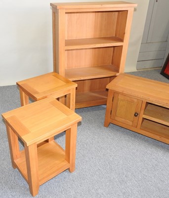 Lot 23 - A collection of light oak furniture