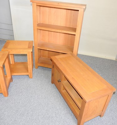 Lot 23 - A collection of light oak furniture