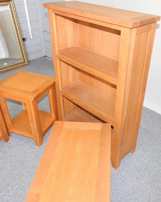 Lot 23 - A collection of light oak furniture