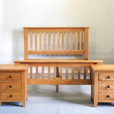 Lot 332 - A bed and a pair of cabinets