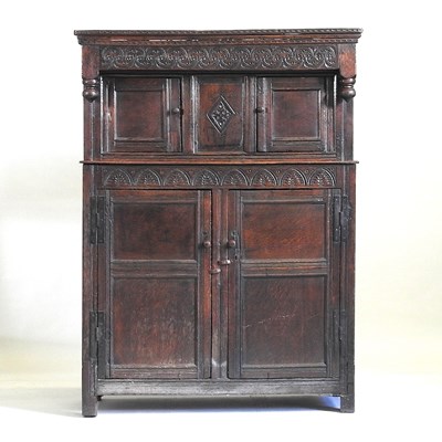 Lot 45 - An oak court cupboard