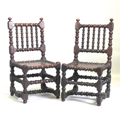 Lot 11 - A pair of 17th century chairs