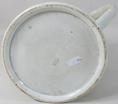 Lot 139 - An unusually large Staffordshire pottery twin handled mug