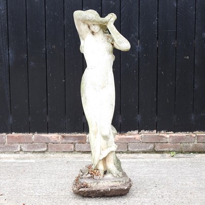 Lot 348 - A cast stone garden figure