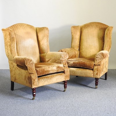 Lot 392 - A pair of wing armchairs