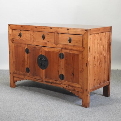 Lot 528 - A 20th century Chinese pine sideboard