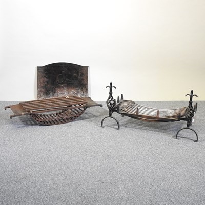 Lot 472 - A fire back and grates