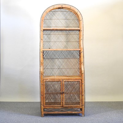 Lot 191 - A wicker bookcase