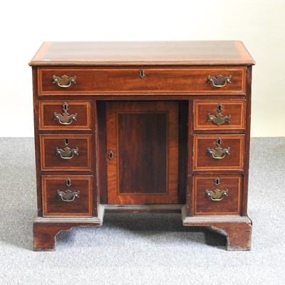 Lot 121 - A George III desk