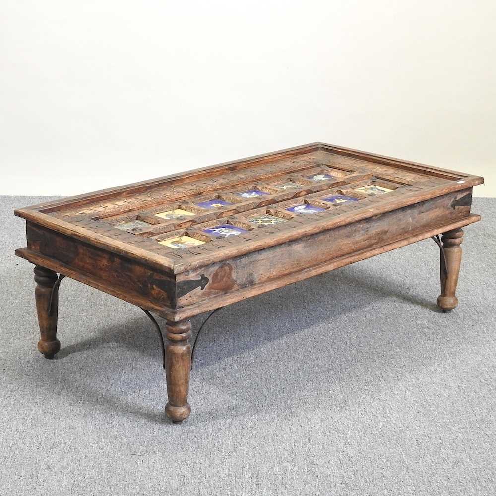 Lot 401 - A coffee table