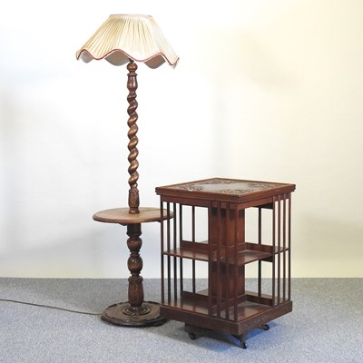 Lot 115 - A bookcase and lamp