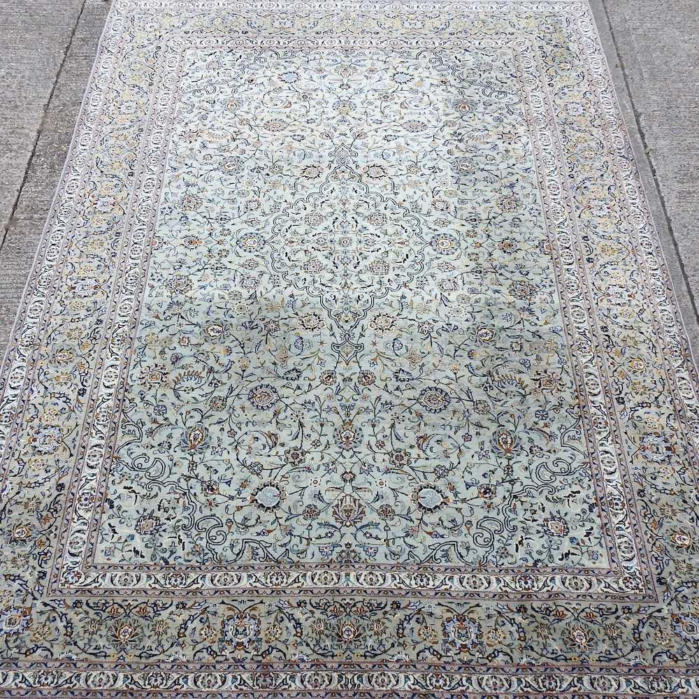 Lot 96 A Persian carpet