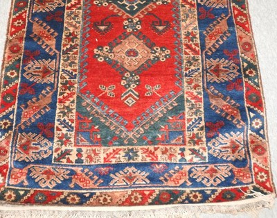 Lot 125 - A Turkish woollen rug
