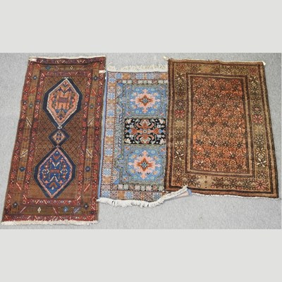 Lot 185 - A Persian woollen rug