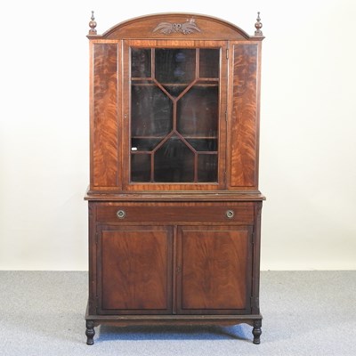 Lot 603 - A display cabinet