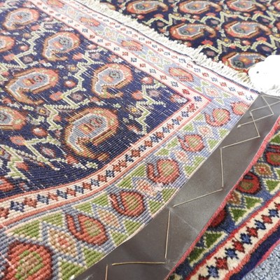 Lot 585 - A Persian runner