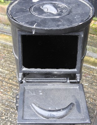 Lot 370 - A portable cast iron cylinder stove