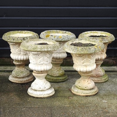 Lot 22 - Five cast stone urns