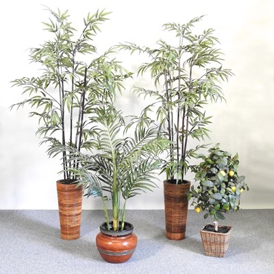 Lot 596 - Four artificial plants