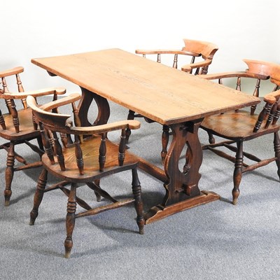 Lot 547 - A table and chairs