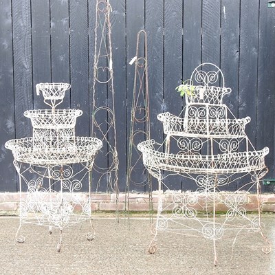 Lot 576 - Four plant stands