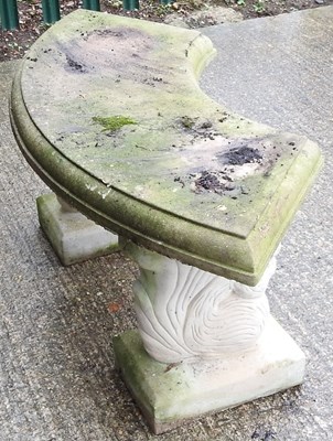 Lot 562 - A stone garden bench