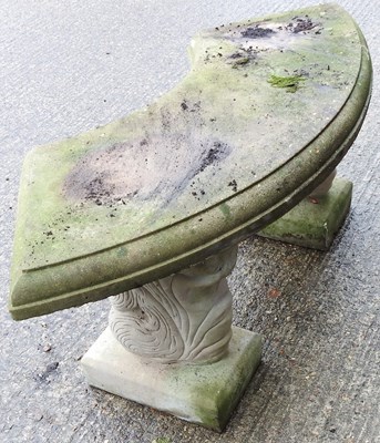 Lot 562 - A stone garden bench