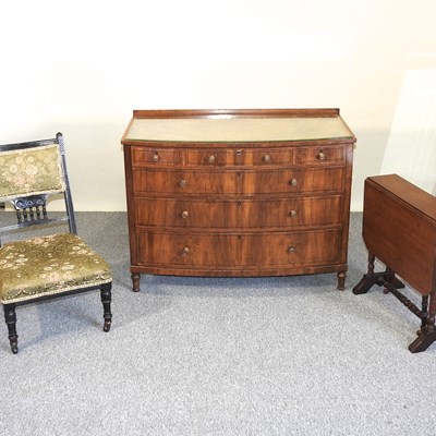 Lot 385 - A walnut chest together with a table and a chair