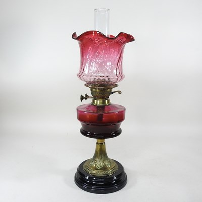 Lot 512 - A glass oil lamp