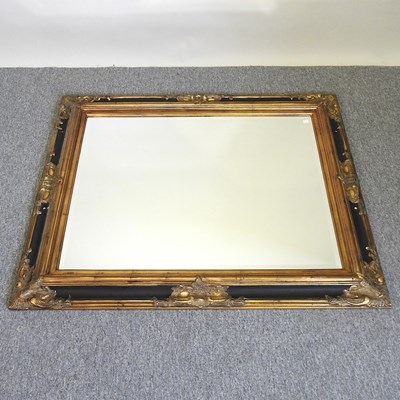 Lot 389 - A wall mirror