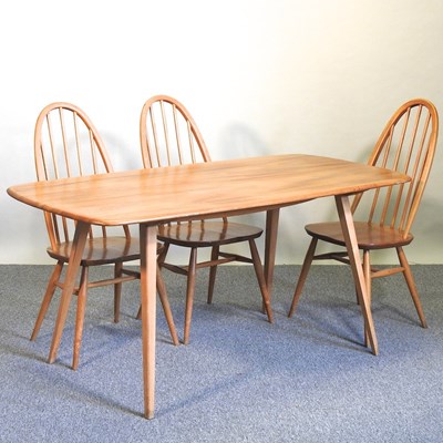 Lot 573 - An Ercol dining suite