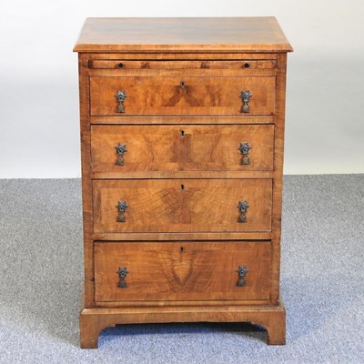 Lot 566 - A walnut chest