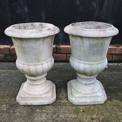 Lot 315 - A near pair of reconstituted stone garden urns