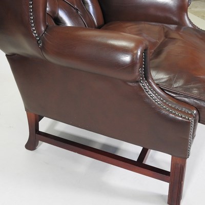 Lot 331 - A wing armchair