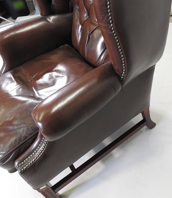 Lot 331 - A wing armchair