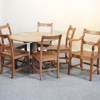 Lot 470 - A table and chairs