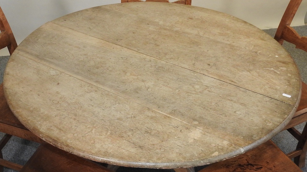Lot 470 - A table and chairs