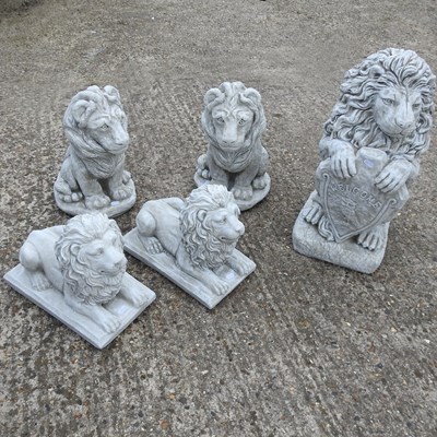 Lot 403 - Five cast stone lions