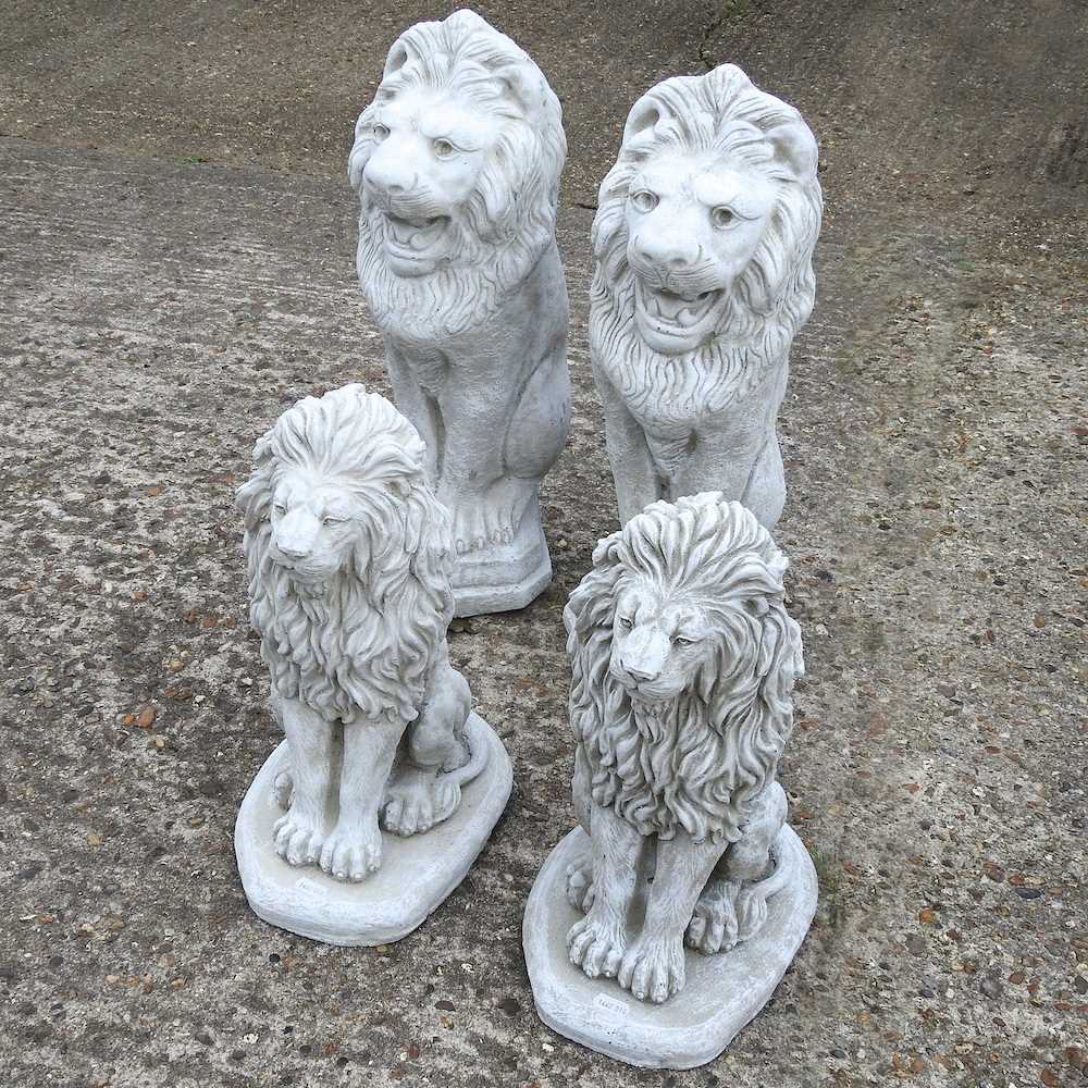 Lot 649 - Two pairs of lions